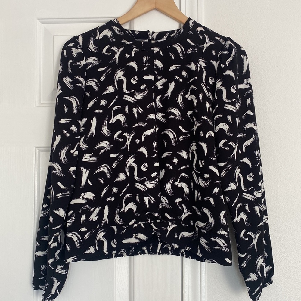 Nine West modern black blouse with solid knot hem.